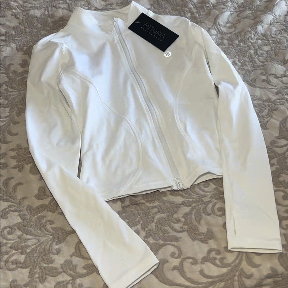 White activewear zip up